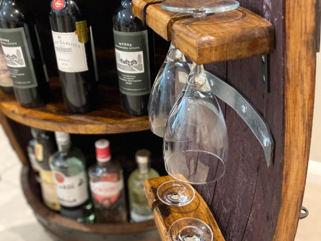 Handcrafted wine barrel mini bar with bottle and glass storage – rustic home bar furniture