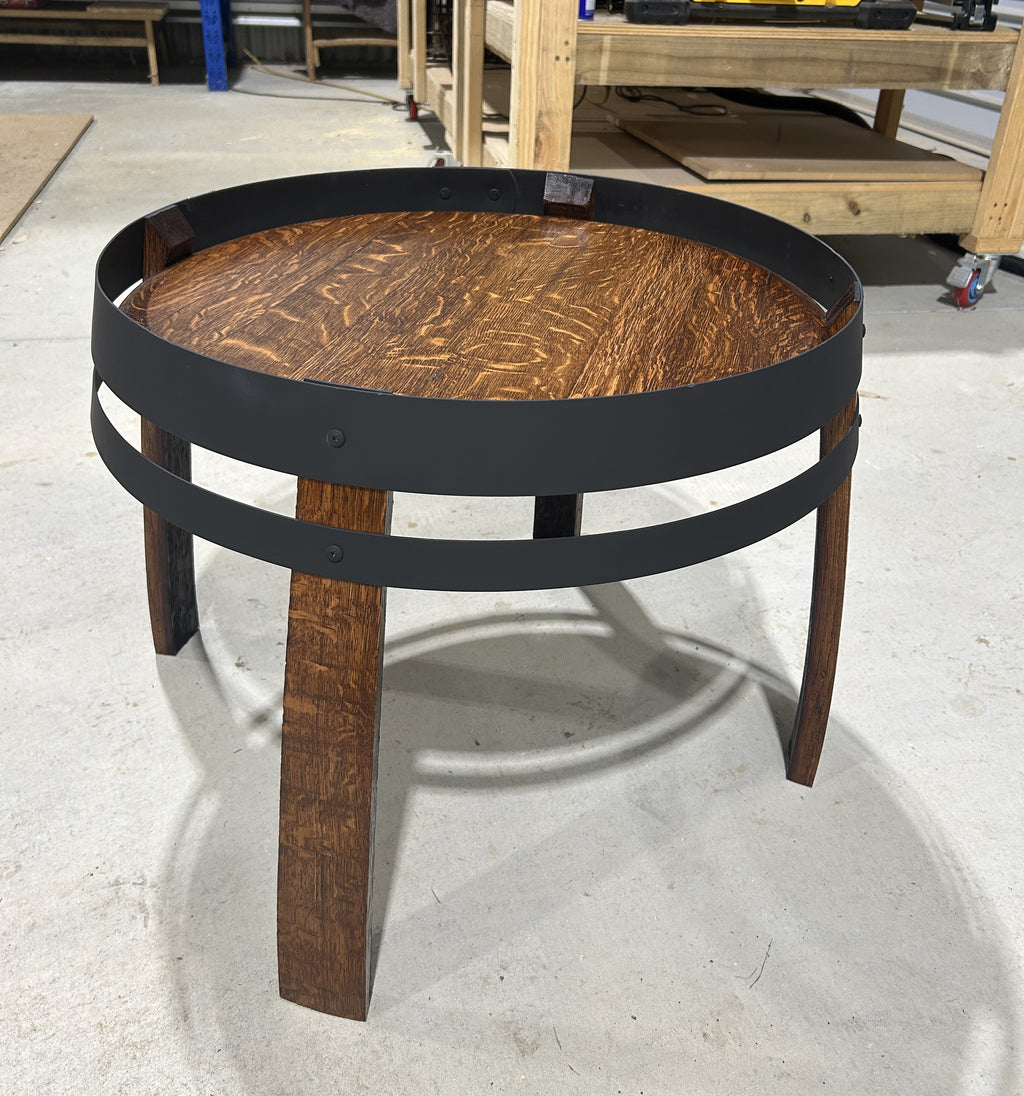 Wine barrel coffee table in walnut stain with matte black steel hoops