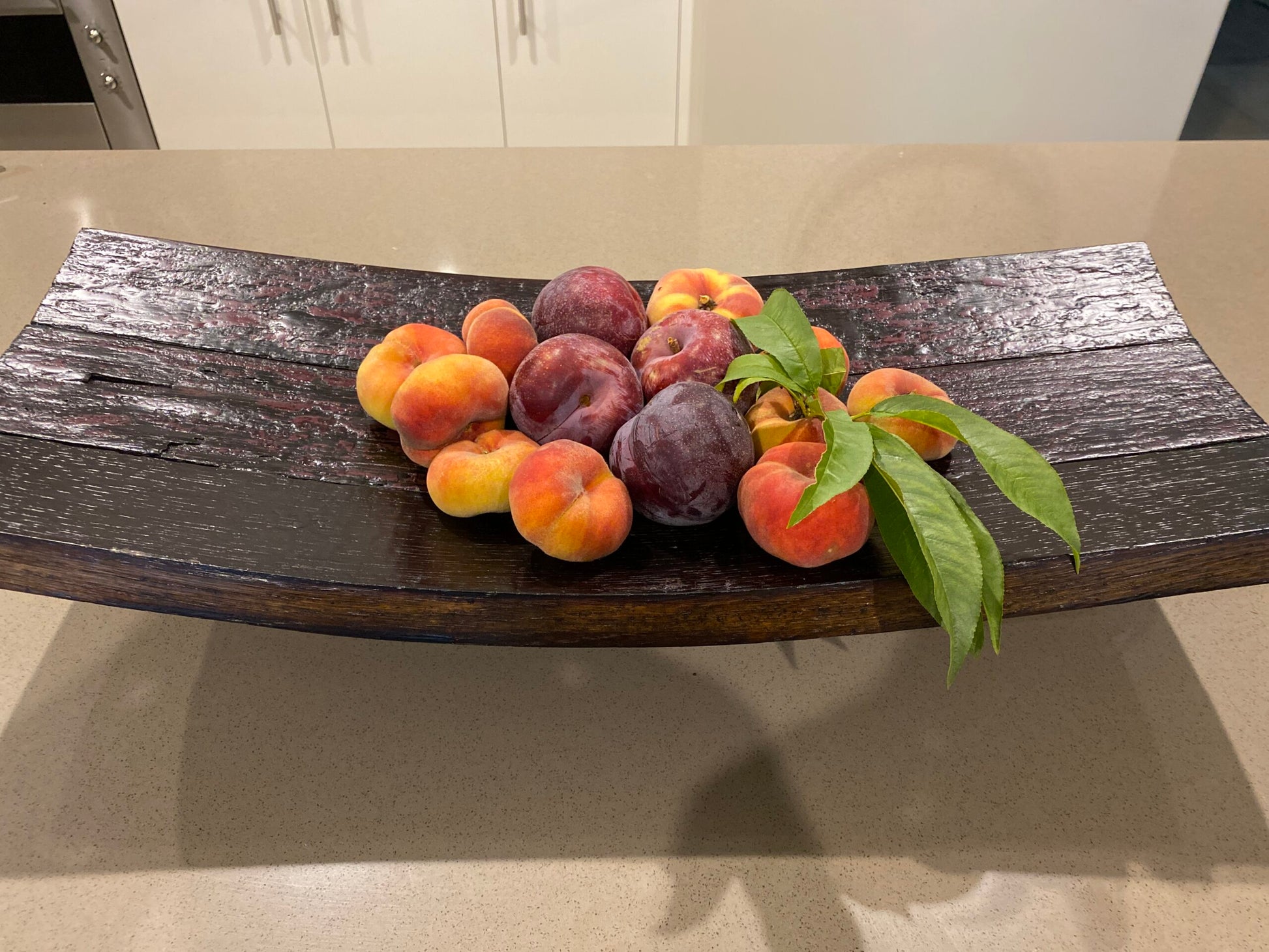 Wine barrel fruit bowl handcrafted from repurposed oak barrel staves – rustic centrepiece with natural wood tones 