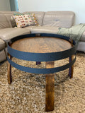 wine barrel coffee table crafted from recycled oak barrels, featuring a compact design with rustic charm – perfect for living rooms or cozy spaces