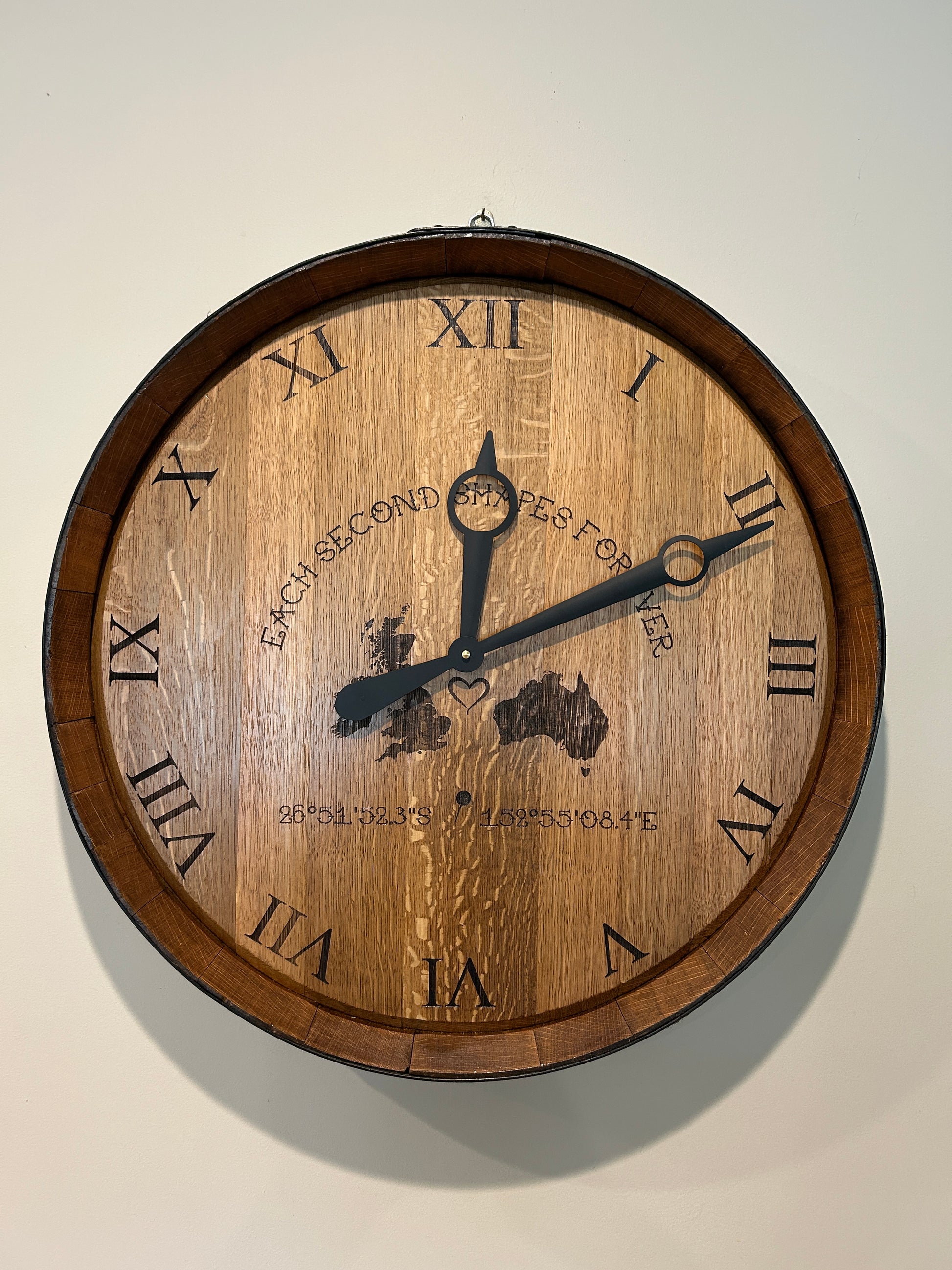 Handcrafted 600mm wine barrel head clock with laser-engraved Roman numerals and custom engraving