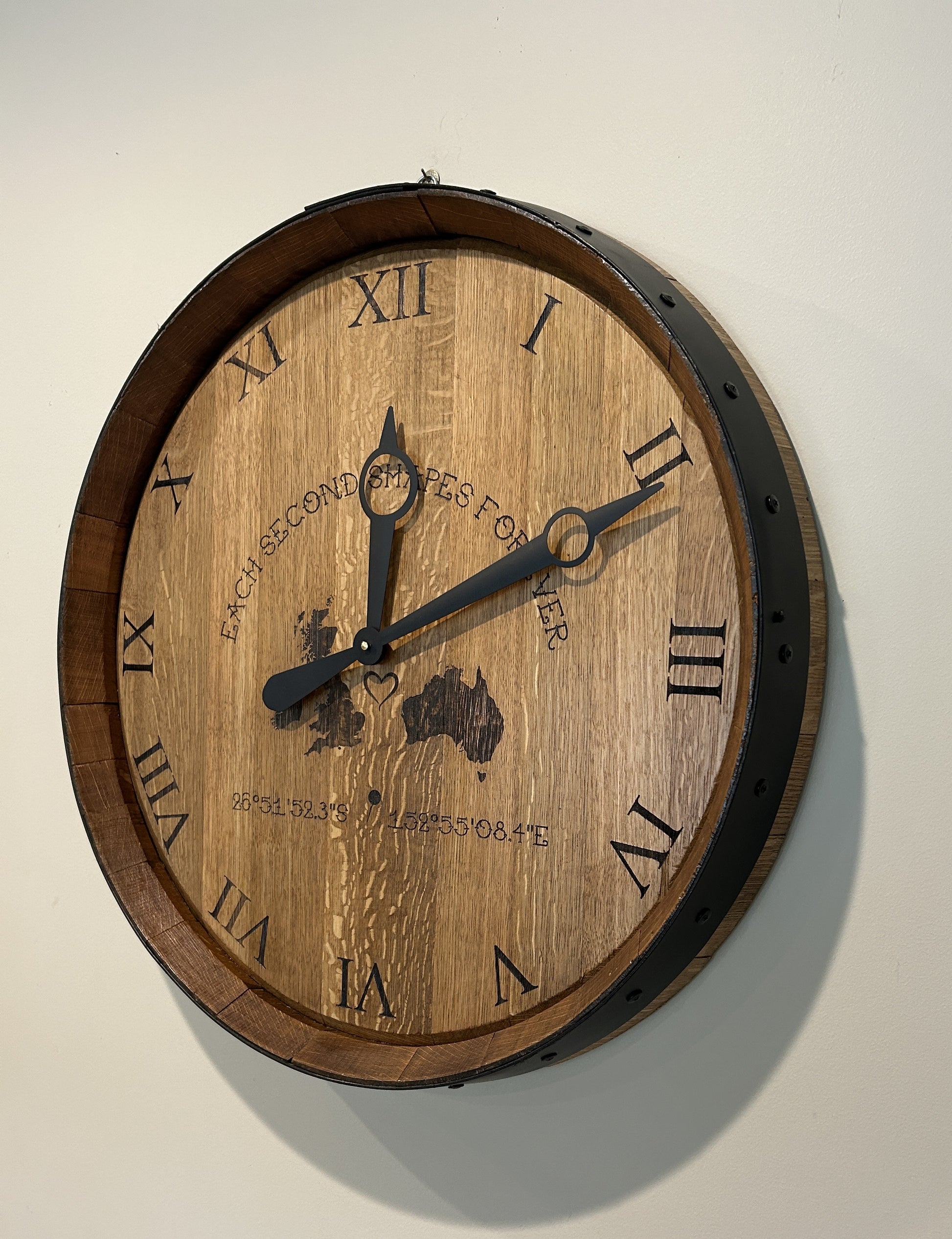Handcrafted 600mm wine barrel head clock with laser-engraved Roman numerals and custom engraving
