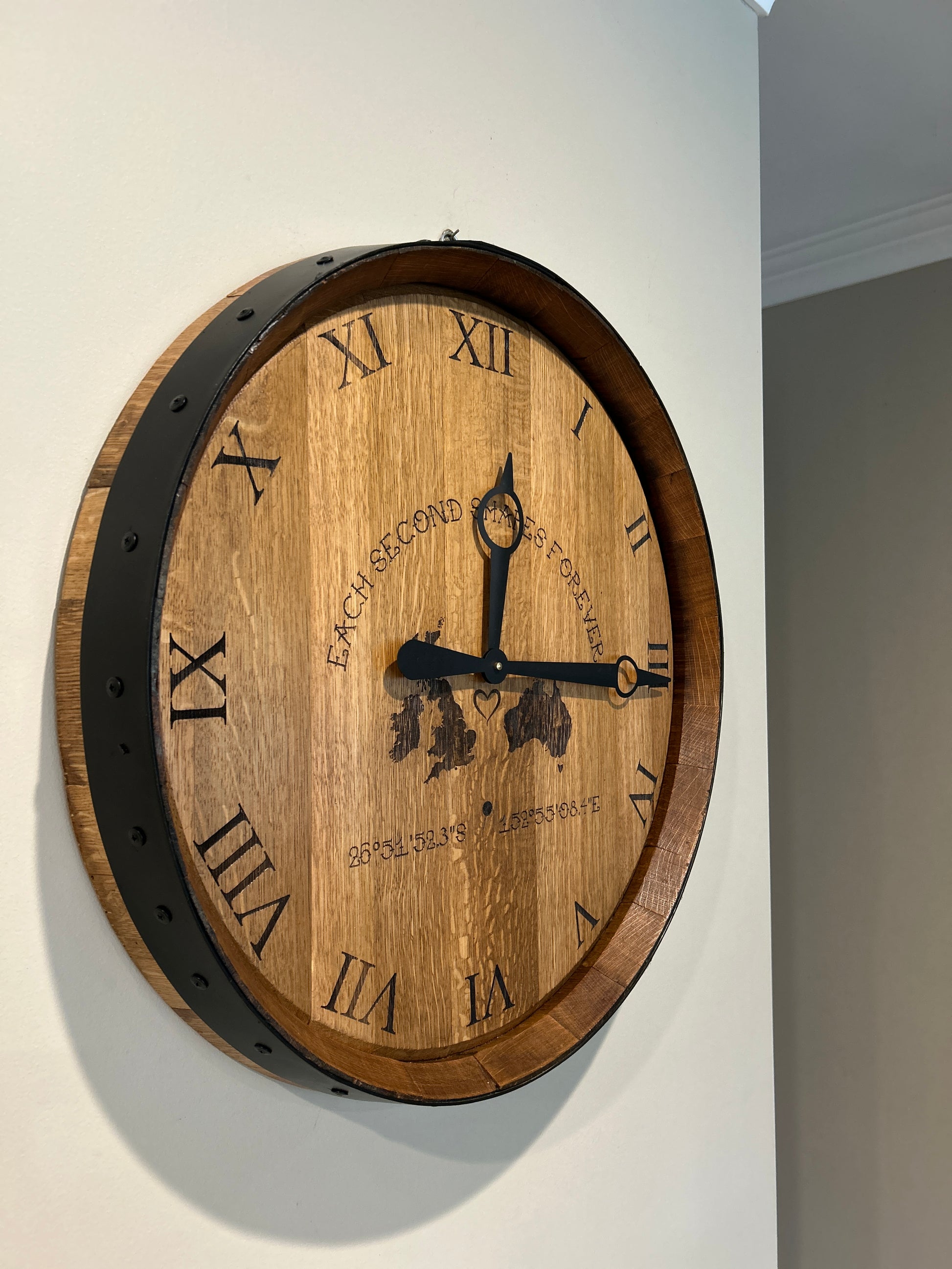 Handcrafted 600mm wine barrel head clock with laser-engraved Roman numerals and custom engraving