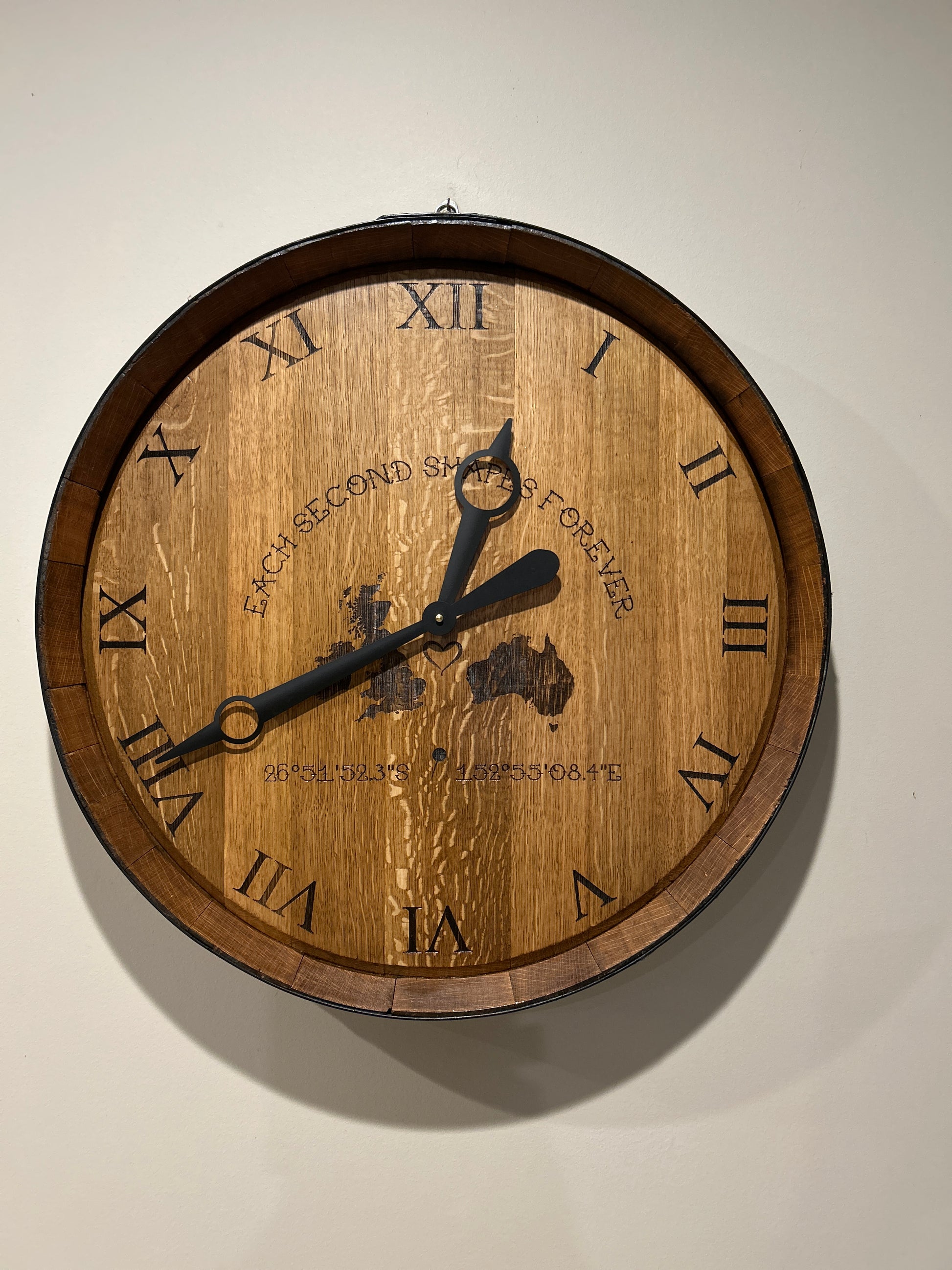 Handcrafted 600mm wine barrel head clock with laser-engraved Roman numerals and custom engraving