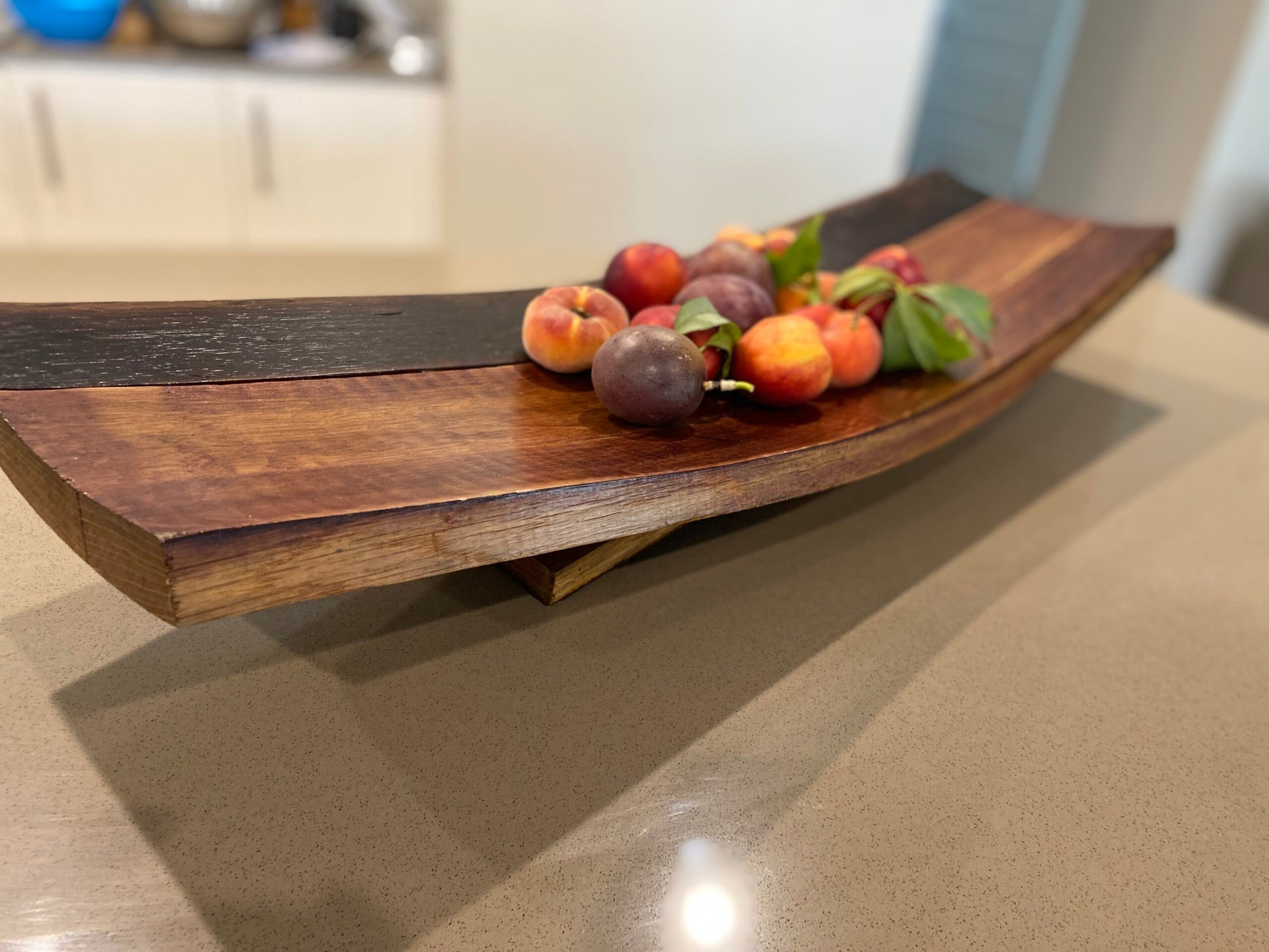 Wine barrel fruit bowl handcrafted from repurposed oak barrel staves – rustic centrepiece with natural wood tones 