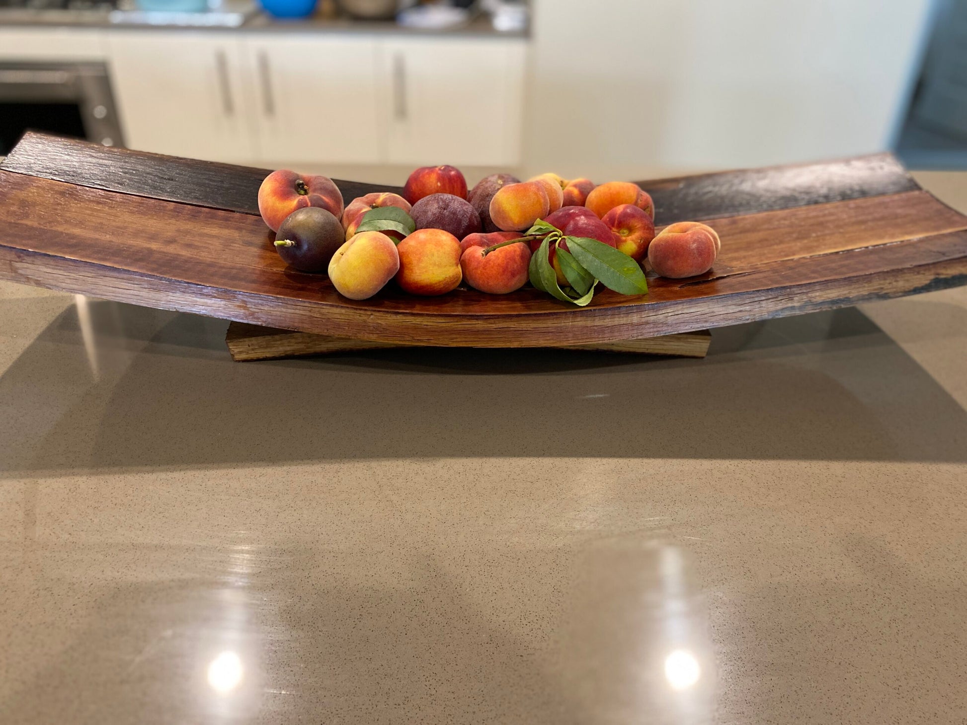 Wine barrel fruit bowl handcrafted from repurposed oak barrel staves – rustic centrepiece with natural wood tones 