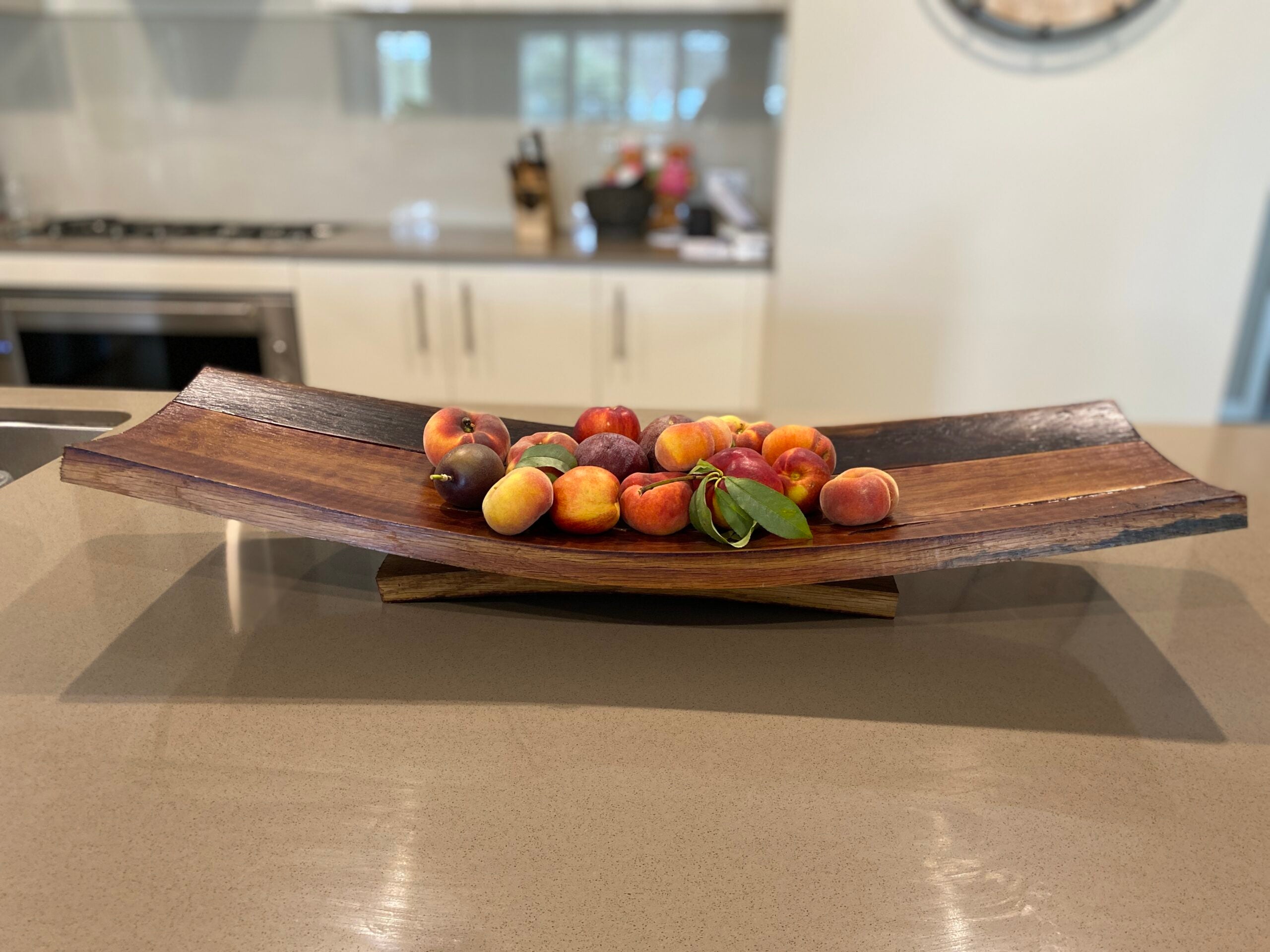 Wine barrel fruit bowl handcrafted from repurposed oak barrel staves – rustic centrepiece with natural wood tones 