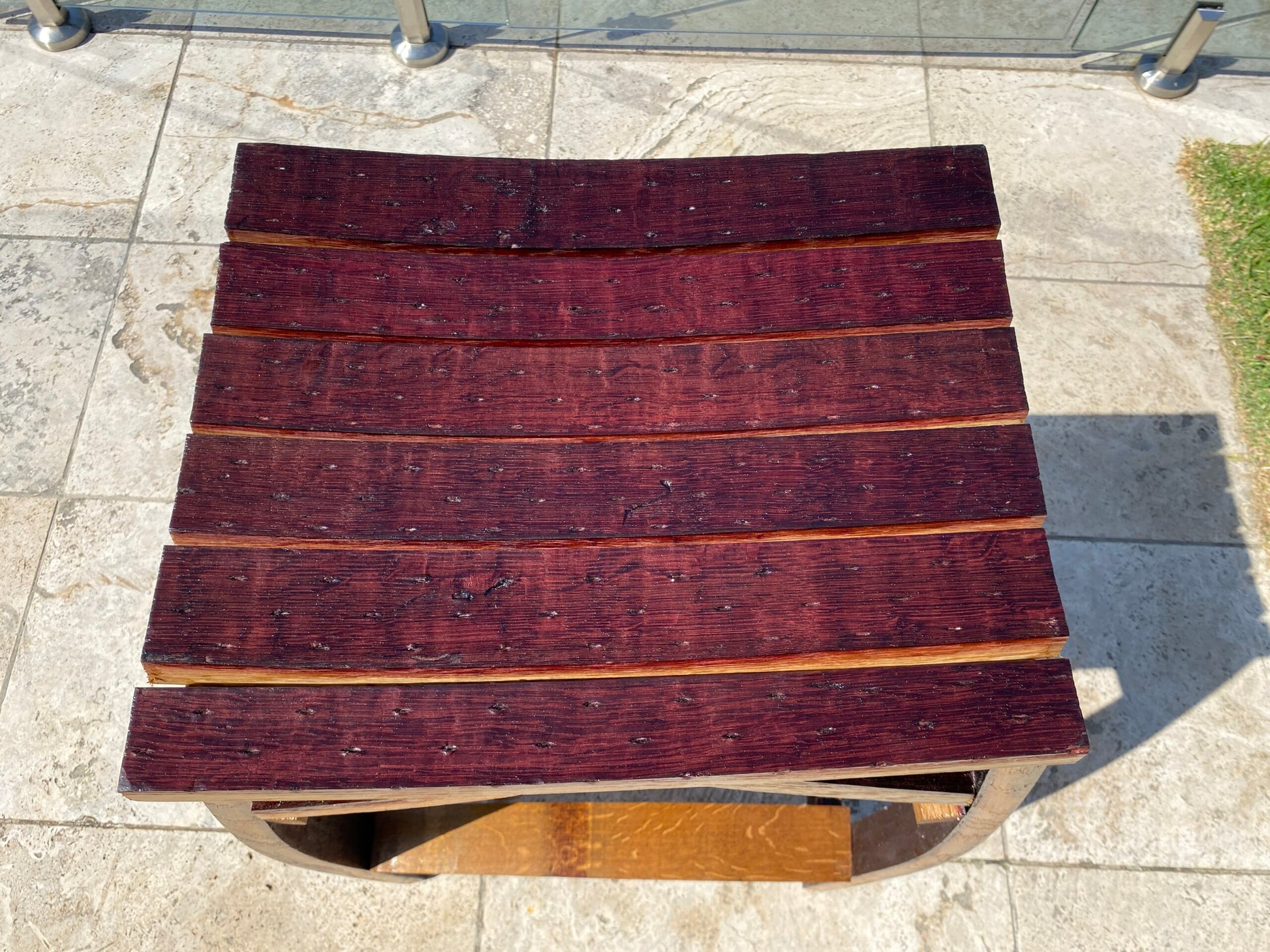 Rustic bar stools handcrafted from reclaimed wine barrels, featuring curved oak staves– perfect for kitchen or home bar seating