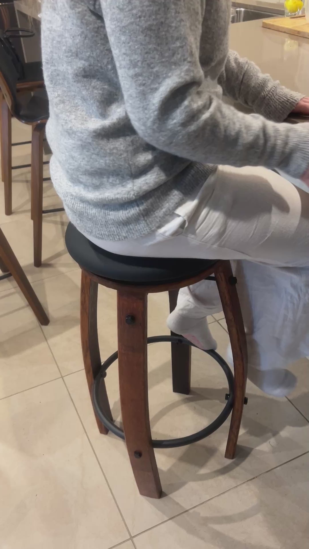 Video demonstrating the swivel function of a handcrafted wine barrel bar stool