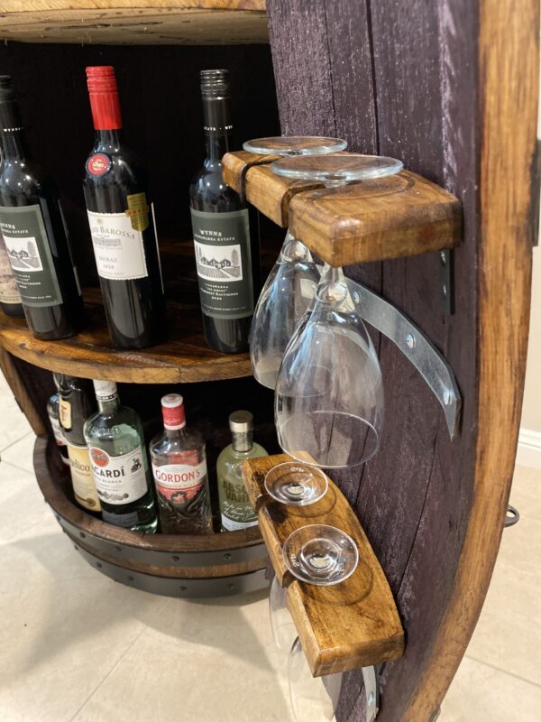 Handcrafted wine barrel mini bar with bottle and glass storage – rustic home bar furniture