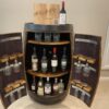 Handcrafted wine barrel mini bar with bottle and glass storage – rustic home bar furniture