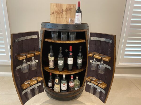 Handcrafted wine barrel mini bar with bottle and glass storage – rustic home bar furniture