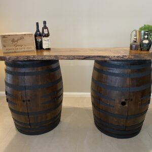 Rustic wine barrel bar with live edge wood slab top and hidden storage – handcrafted with built-in shelves for bottles and glassware